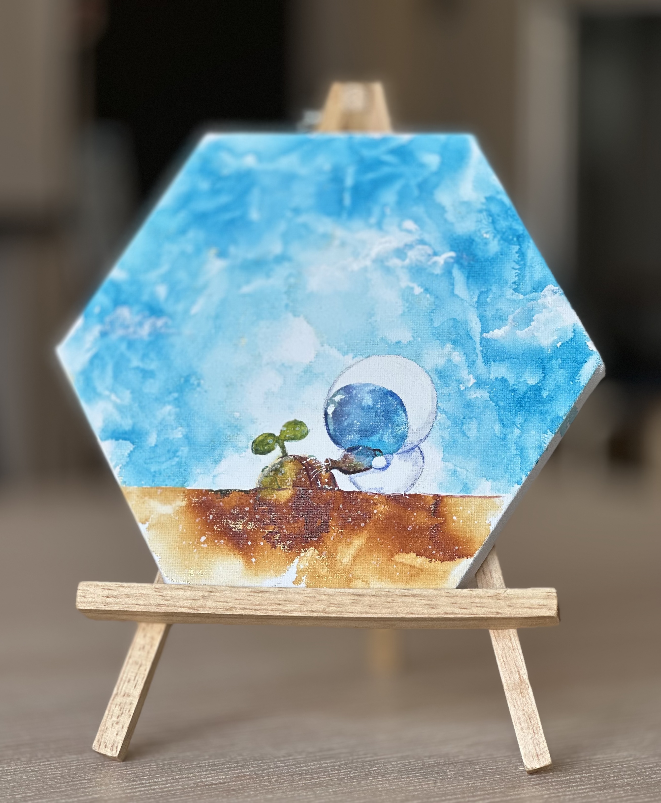 種を芽吹かせる宇宙飛行士さん